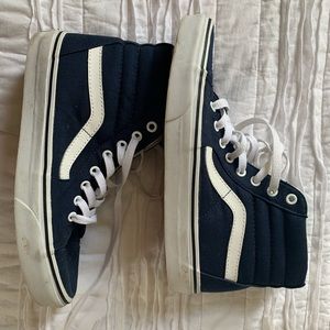 Navy blue Vans high tops